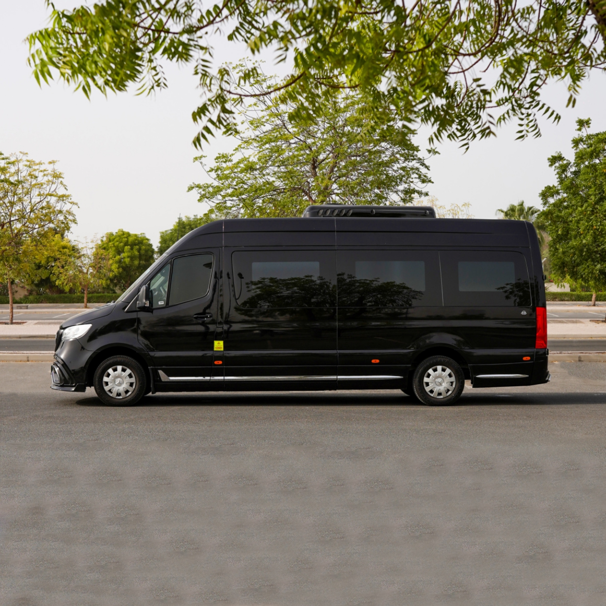 Rent Maybach Royal Sprinter 9 Seater BLACK 2025 with chauffeur in Dubai , UAE 