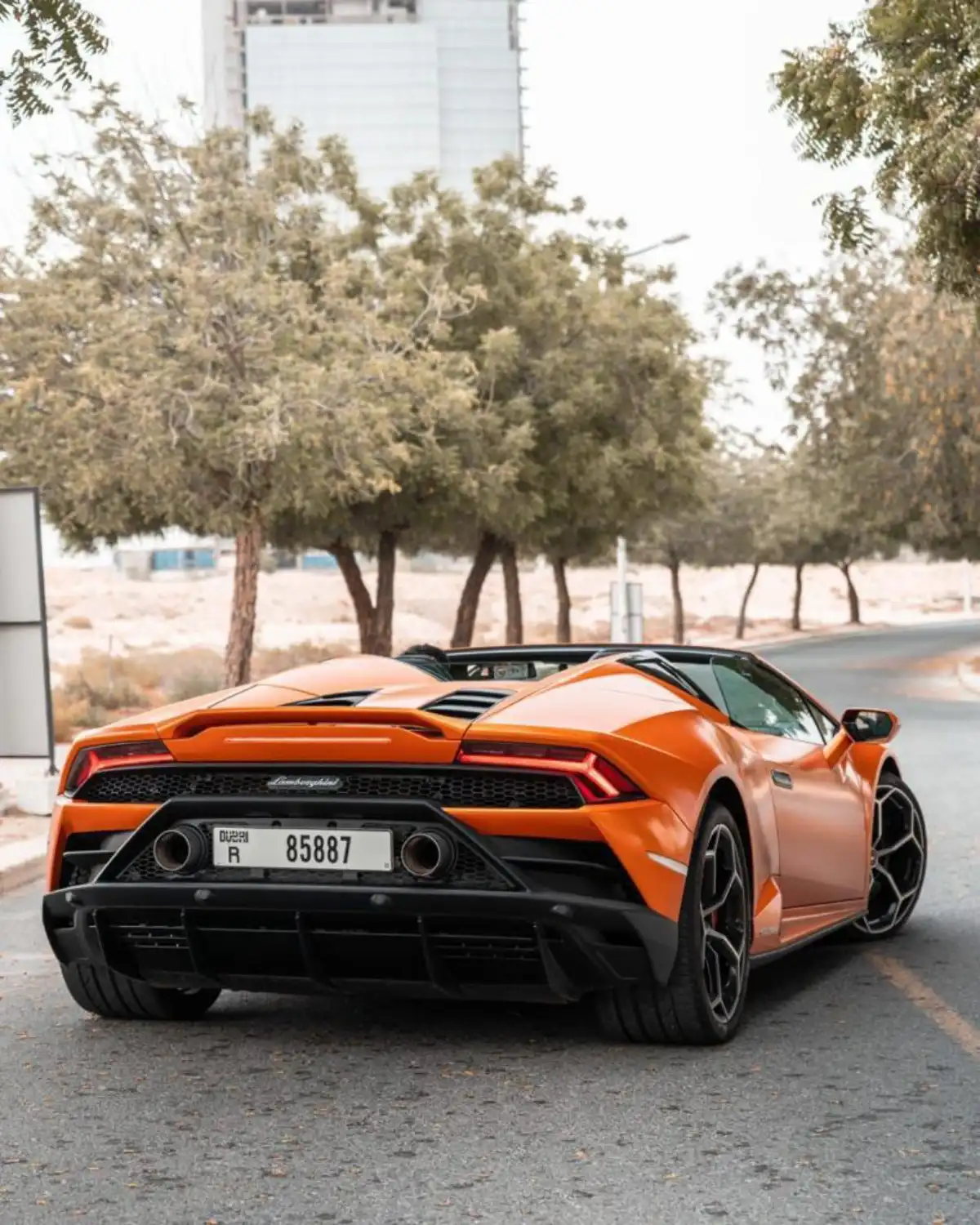 Rent Lamborghini Huracan ORANGE 2023 in Dubai , UAE 