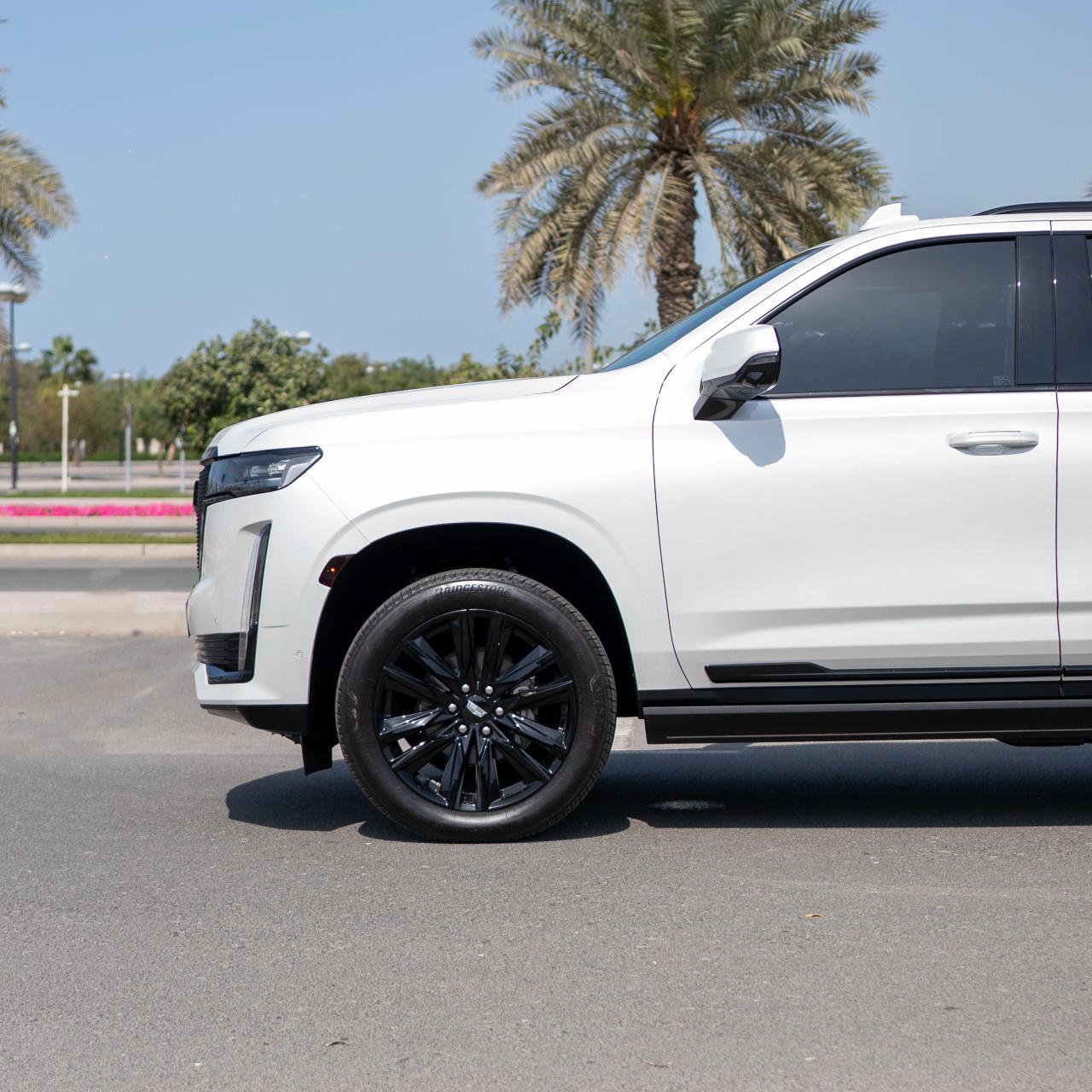 Rent Escalade WHITE 2025 with chauffeur in Dubai , UAE 
